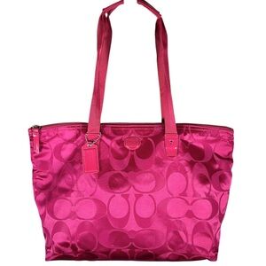 COACH Getaway Signature Nylon Packable Weekender tote bag in hot pink